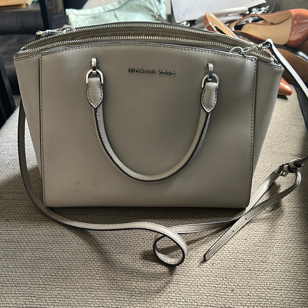 Gray mid sized Michael Kors purse